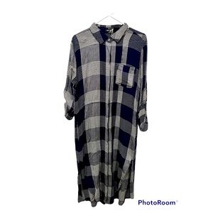 Dear John navy plaid shirt dress. It’s super cute with boots and a belt.